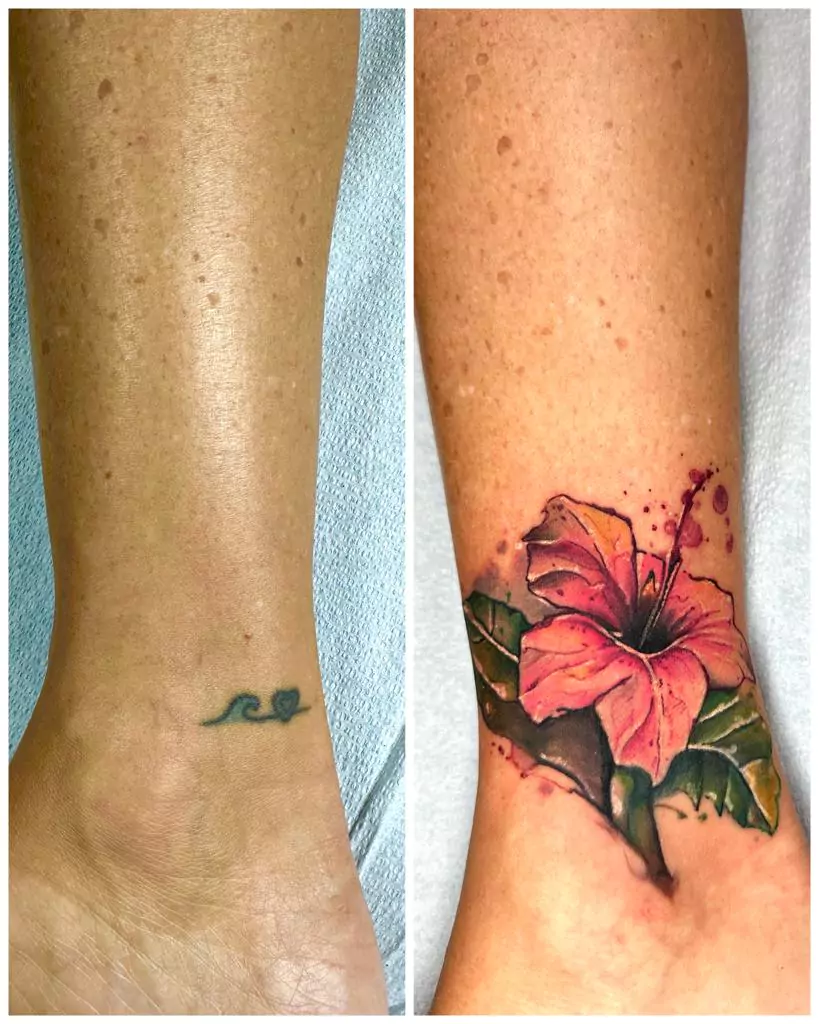 Pink lotus watercolor cover up tattoo on ribs artistic fix Boca Raton
