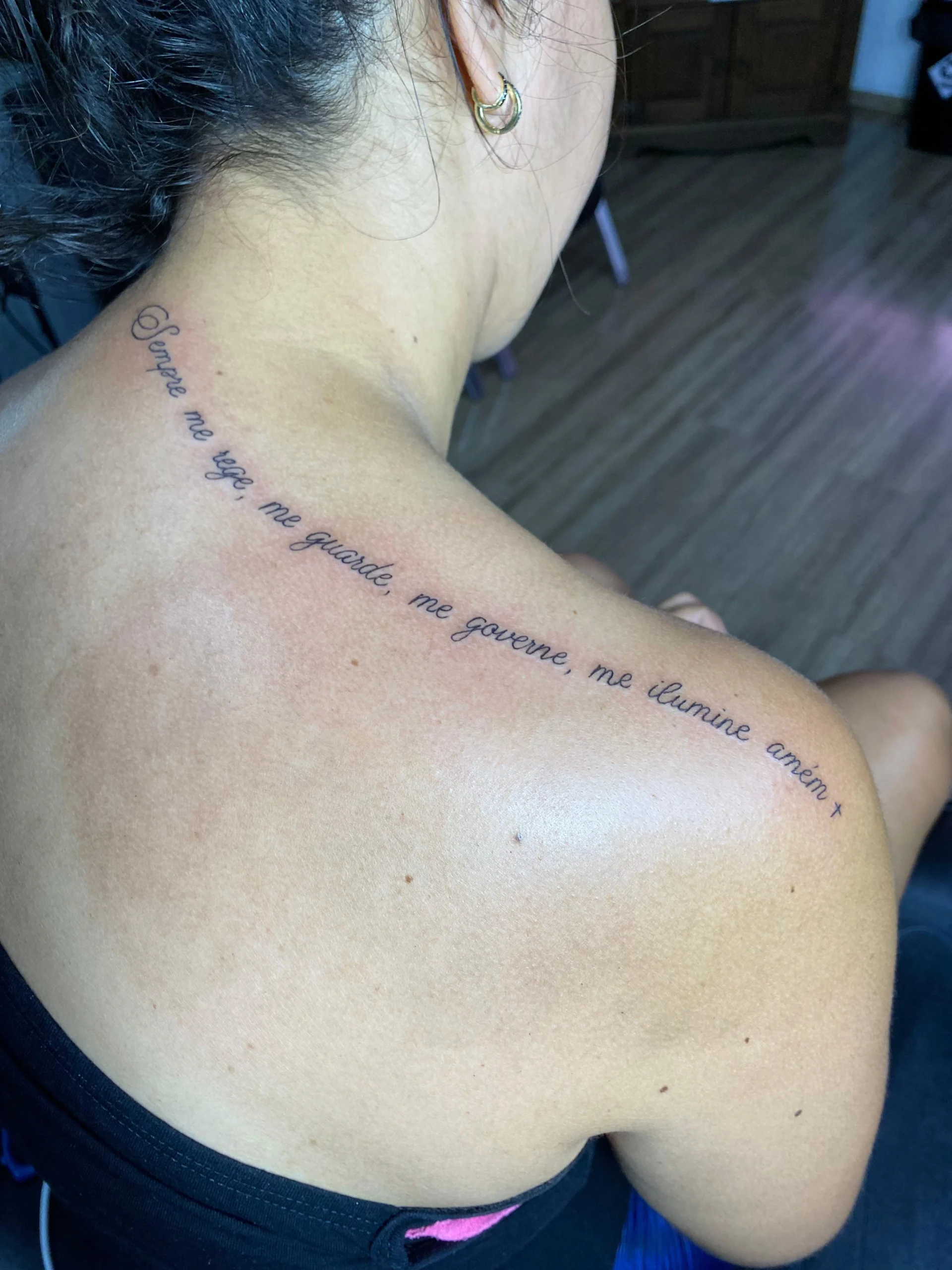 Fine line ornamental spine tattoo lotus and unalome design back ink Boca Raton