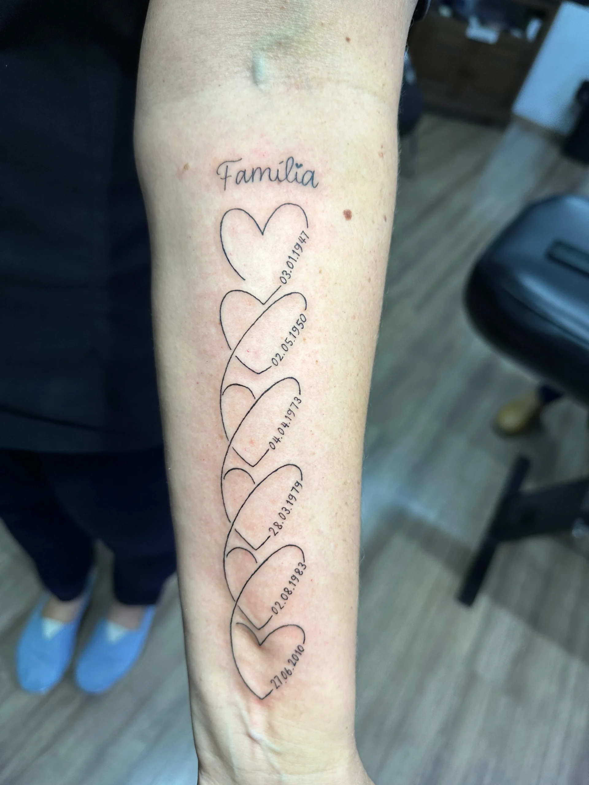 Intertwined hearts family dates tattoo memorial timeline forearm Boca Raton
