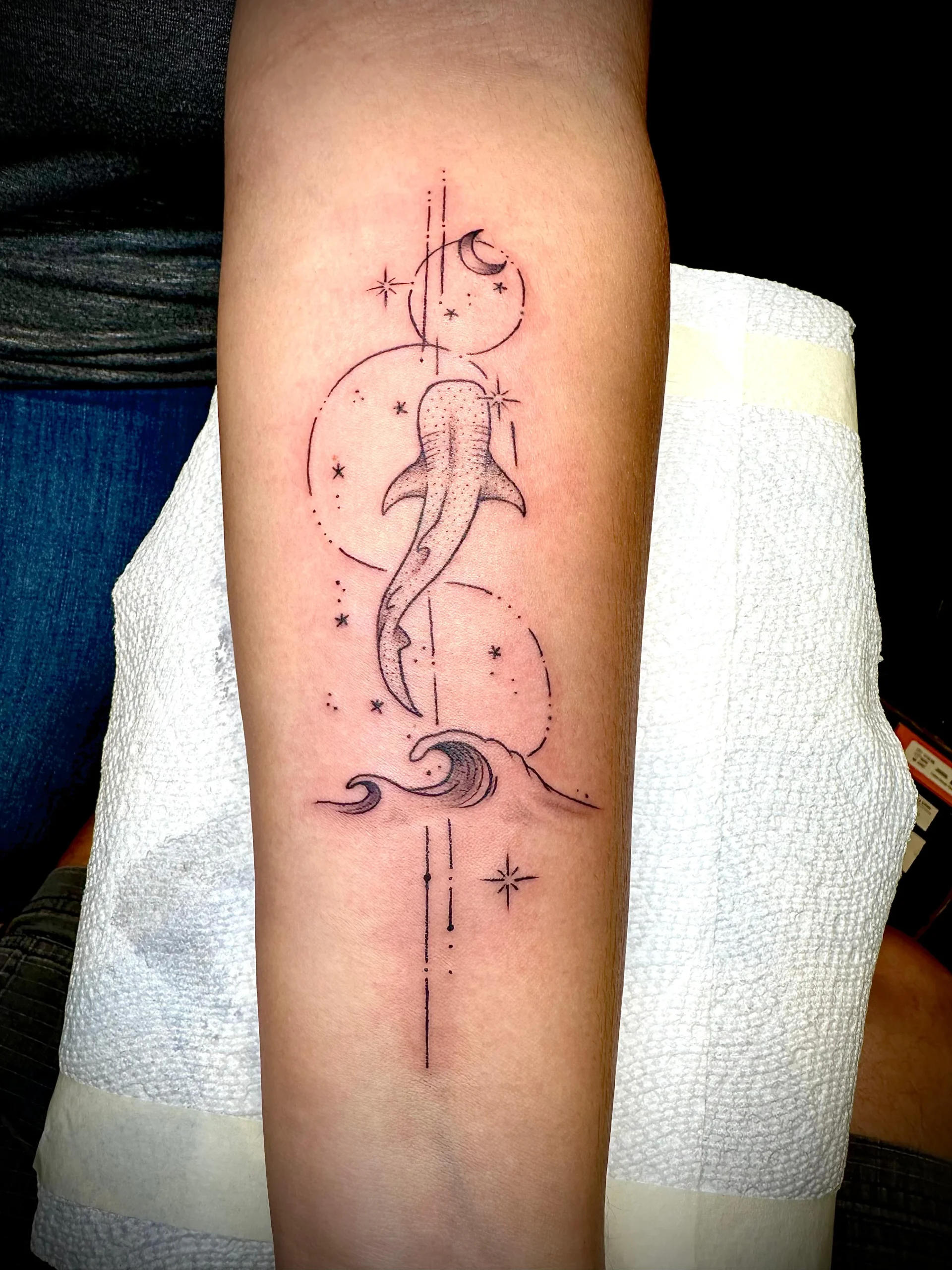 Geometric whale shark and ocean wave tattoo fine line forearm design Boca Raton