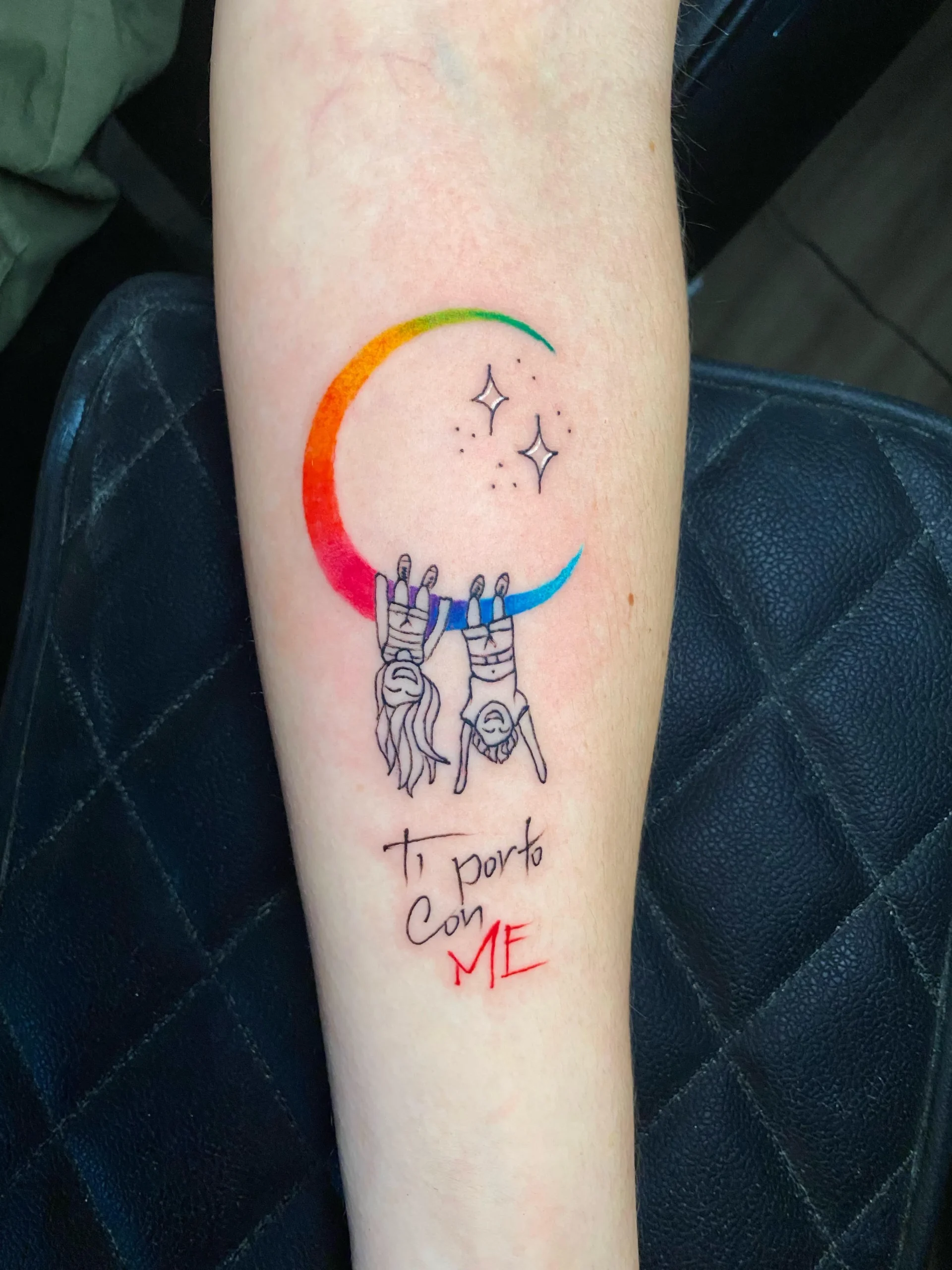 Rainbow moon tattoo with kids hanging script quote colorful arm ink Boca Raton