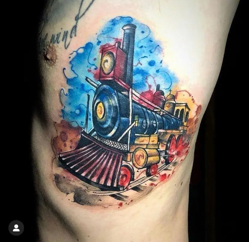 Watercolor steam train locomotive tattoo on ribs colorful artistic ink Boca Raton tattoo artist
