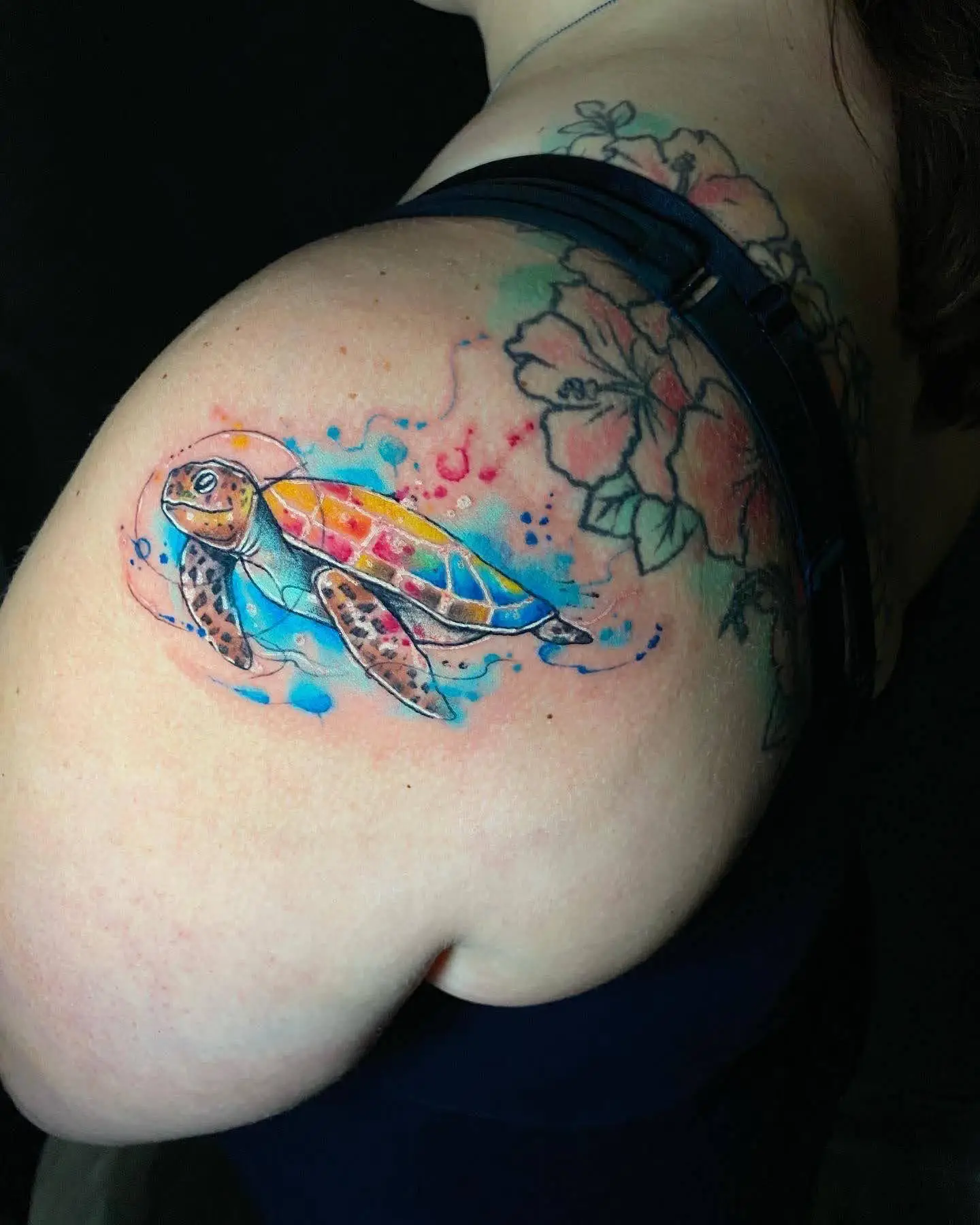 Vibrant watercolor sea turtle tattoo on shoulder marine life ink South Florida Boca Raton
